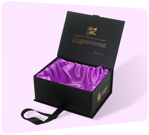 Premium black gift box with a ribbon pull-tab and velvet interior, designed for luxury product packaging.