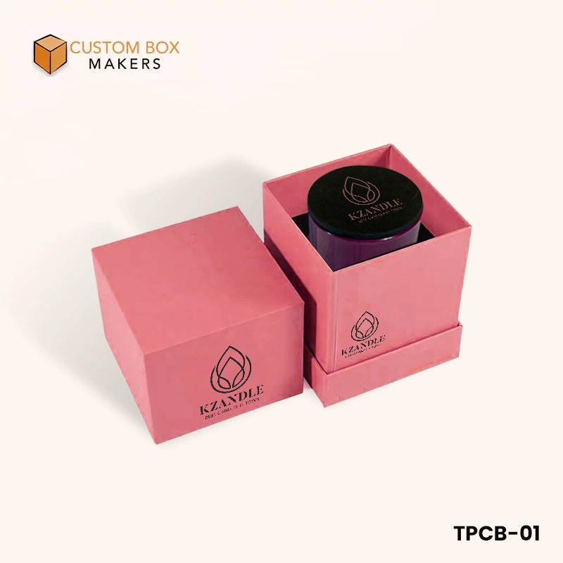 Luxury candle box packaging: pink square box with fitted interior, showcasing a purple candle with black lid